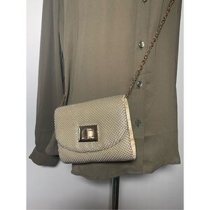 La ragale Golden color clutch